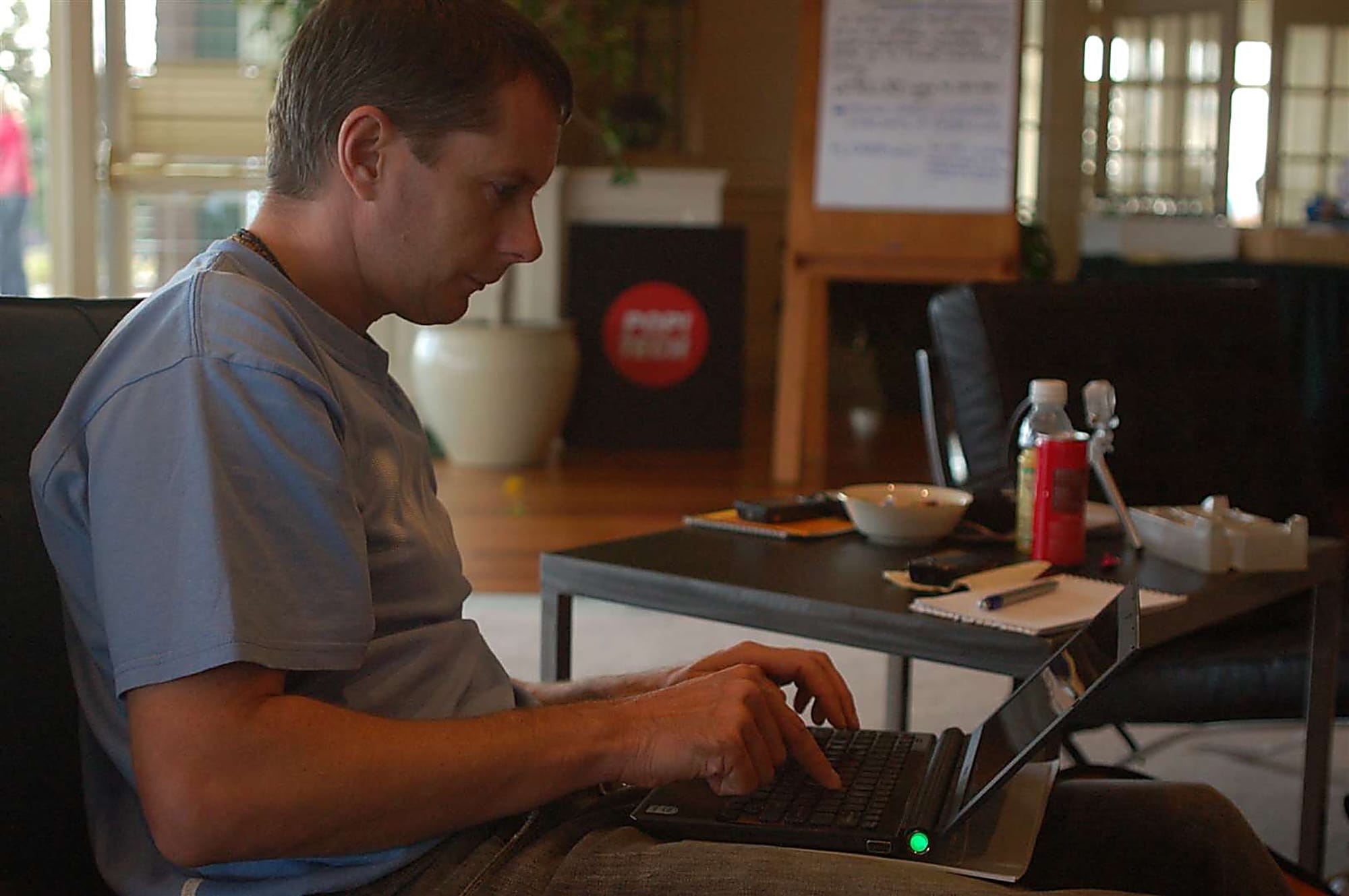 Ken Banks at a laptop, available for advisory, interim and project work